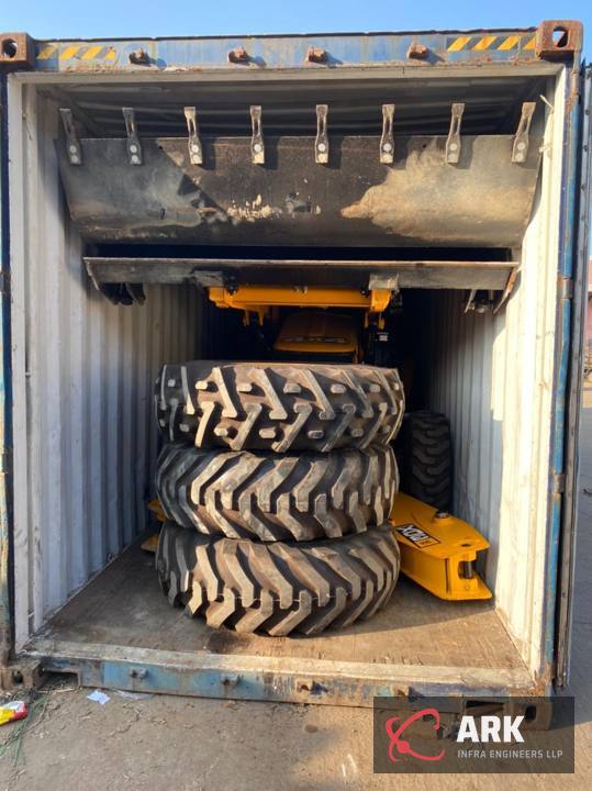 Tyres and bucket packed for export