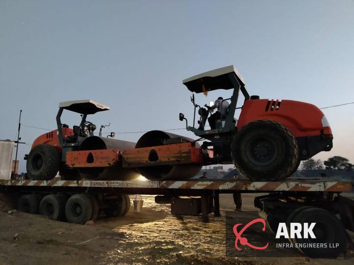 Vibratory soil compactors loaded for delivery