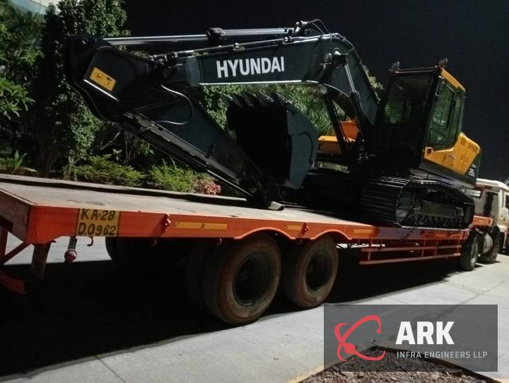 Excavator loaded for dispatch